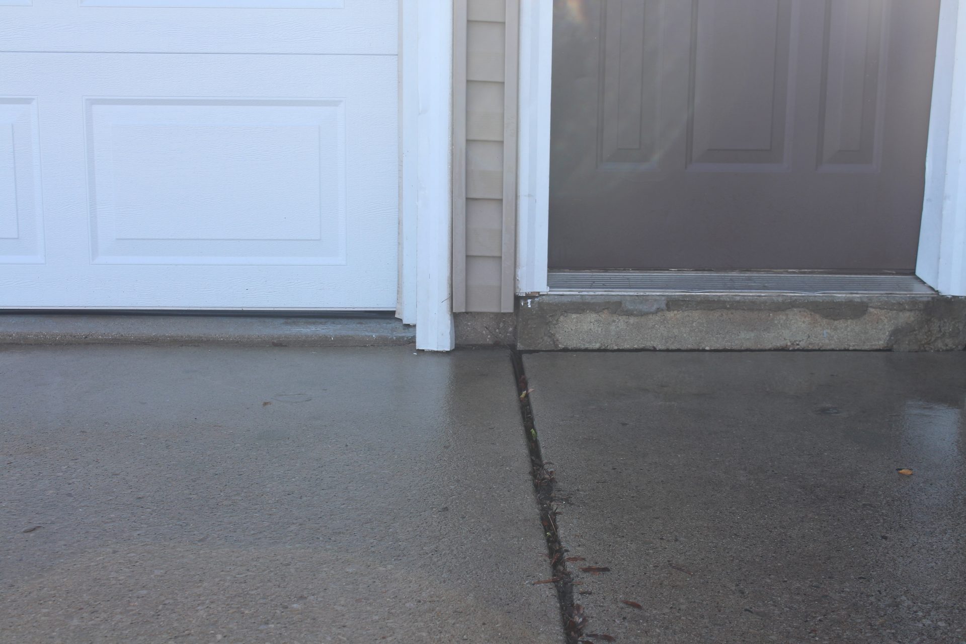 Patio slab lifted level and stable after foam concrete lifting Utah County